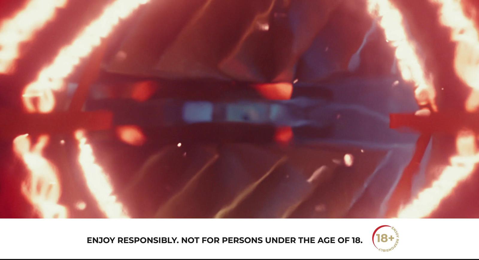 a close up of a fire ring with a red background