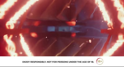 a close up of a fire ring with a red background