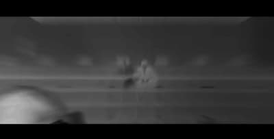 a blurry image of a person in a room