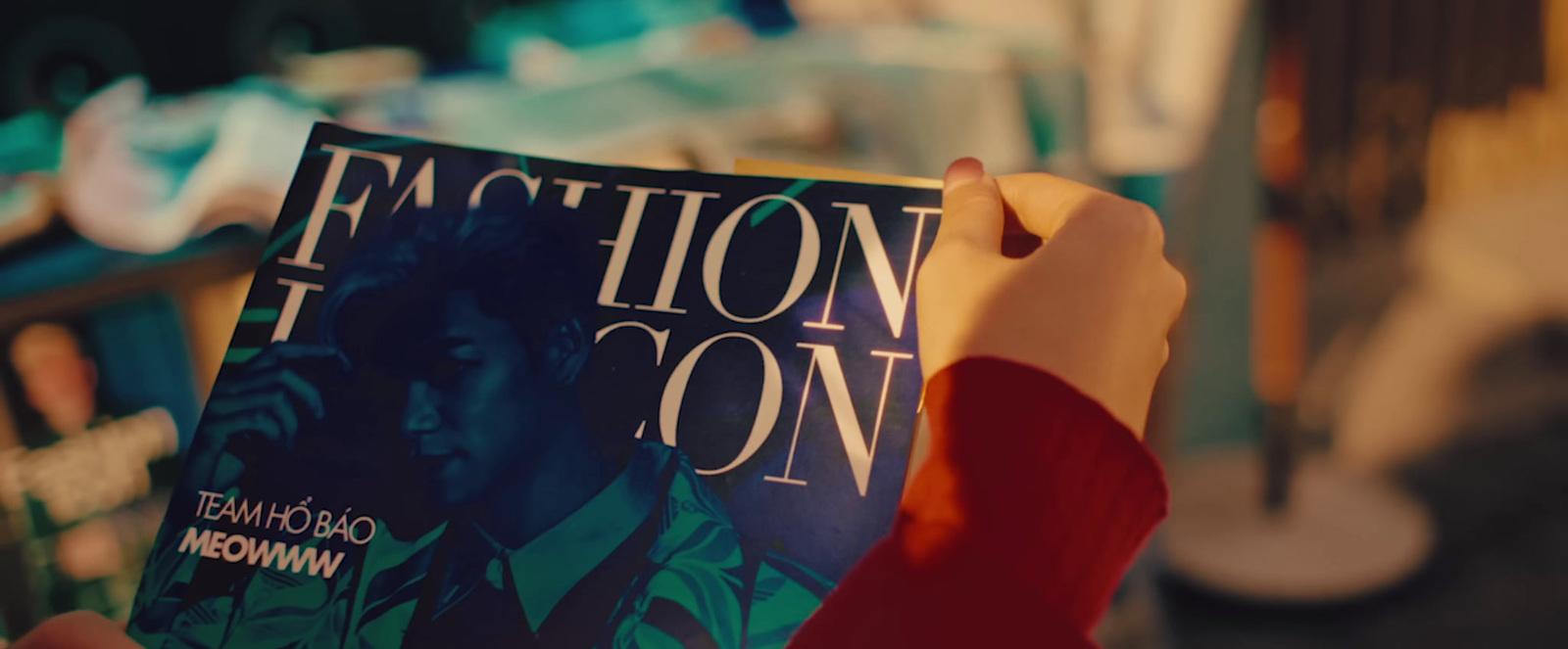 a person holding a book in their hand