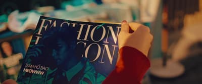 a person holding a book in their hand