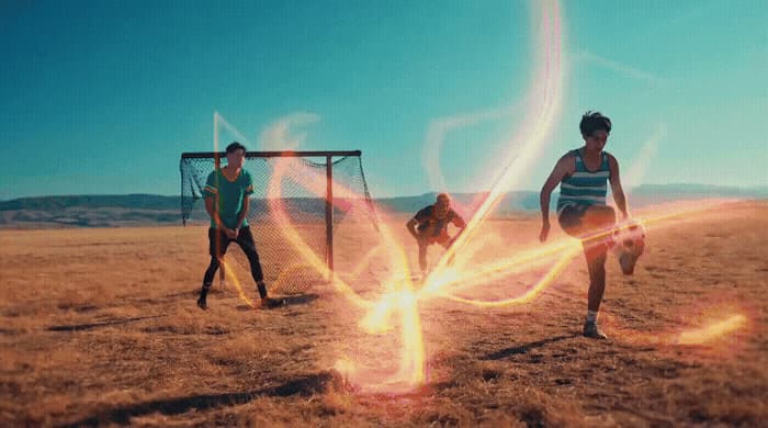 a group of people playing a game of soccer