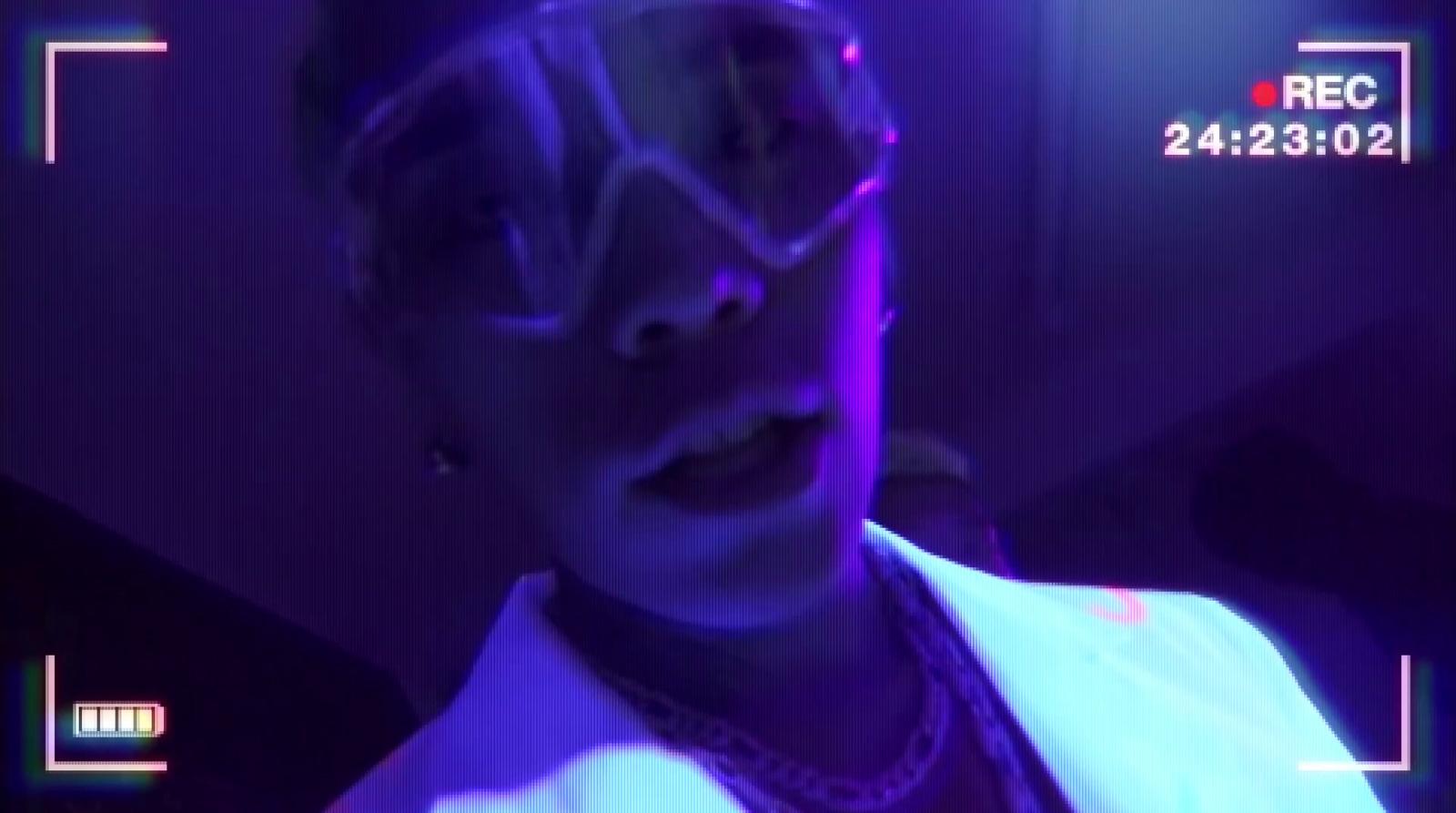 a woman wearing goggles and a white jacket