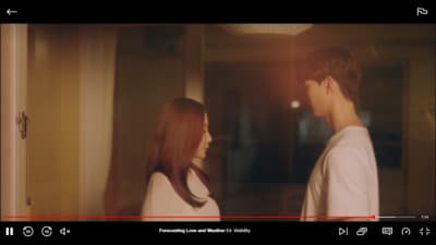 a man and a woman standing next to each other