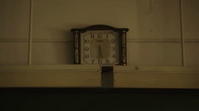 a clock on a wall in a room