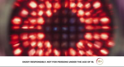 a close up of a red object with a blurry background