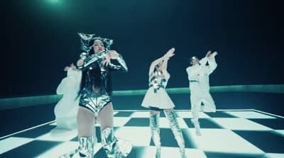 a group of people on a checkered floor