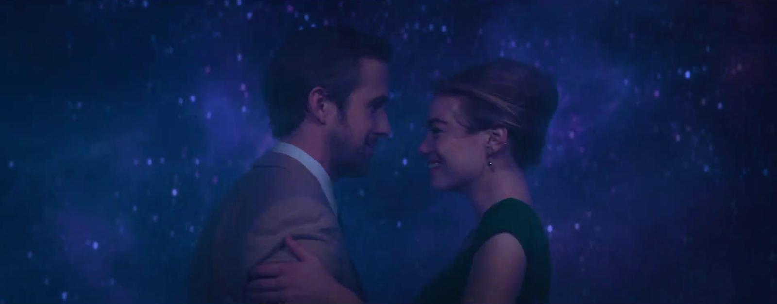a man and a woman standing next to each other