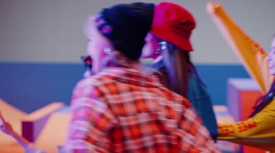 a couple of women standing next to each other