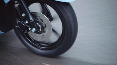 a close up of a motorcycle tire on a road