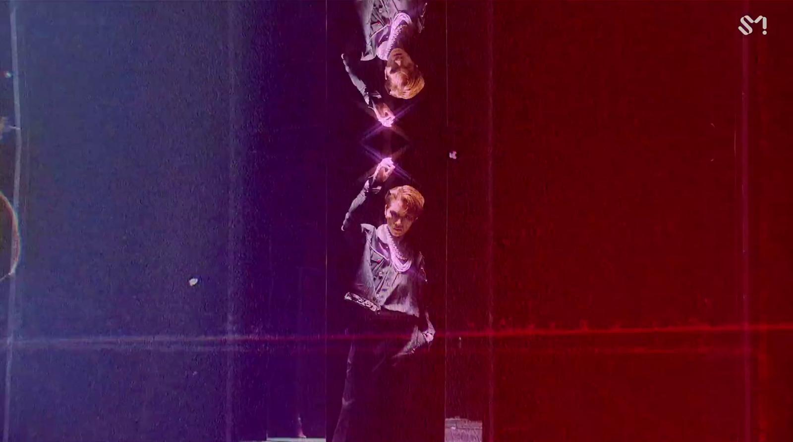 a group of people standing on top of a stage