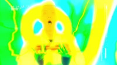 a blurry image of a person sitting at a table