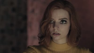 a close up of a person with red hair