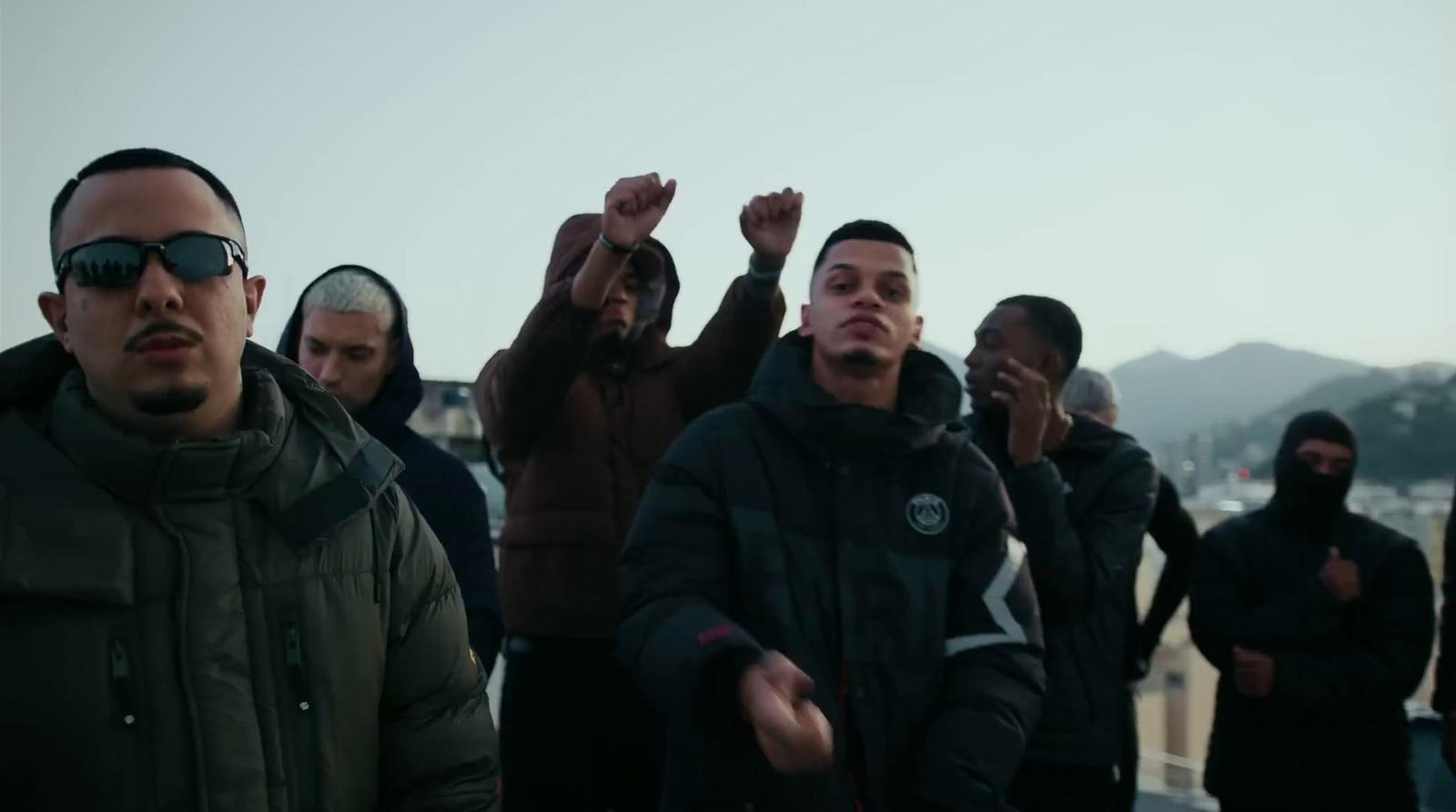 a group of men standing next to each other