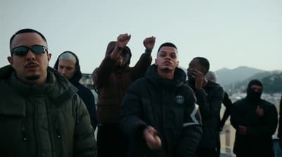 a group of men standing next to each other