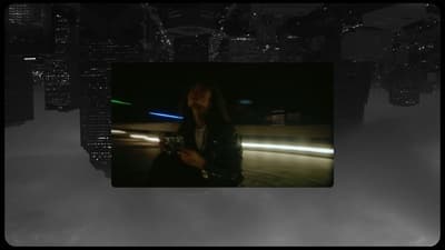 a man standing in the middle of a city at night