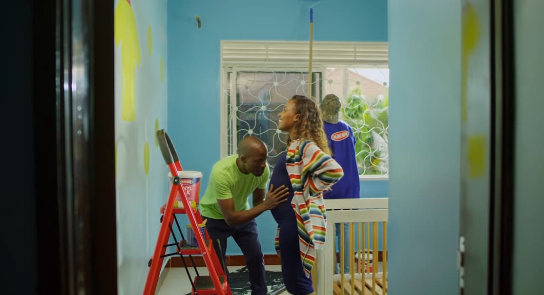 a couple of people that are standing in a room
