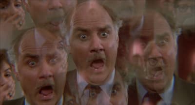 a group of men with their mouths open