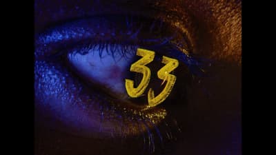 a close up of a person's eye with the number 35 painted on it
