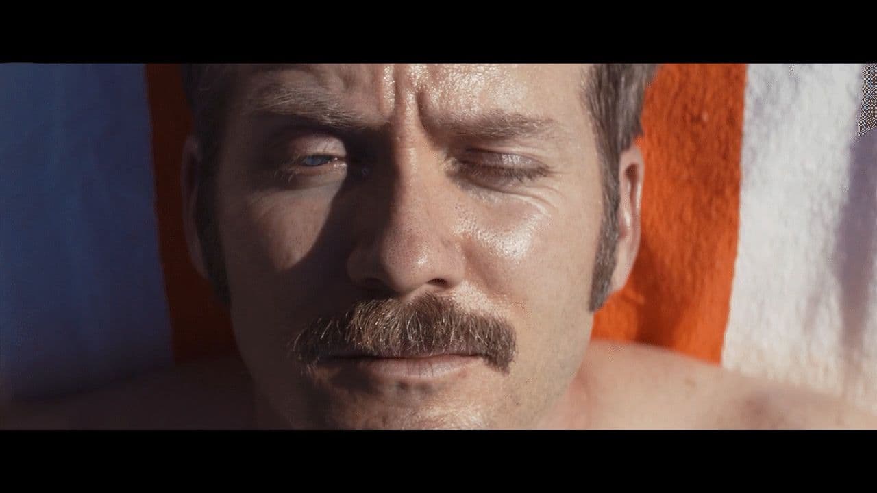 a close up of a man with a mustache
