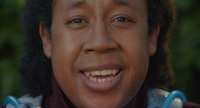 a close up of a person wearing a neck tie