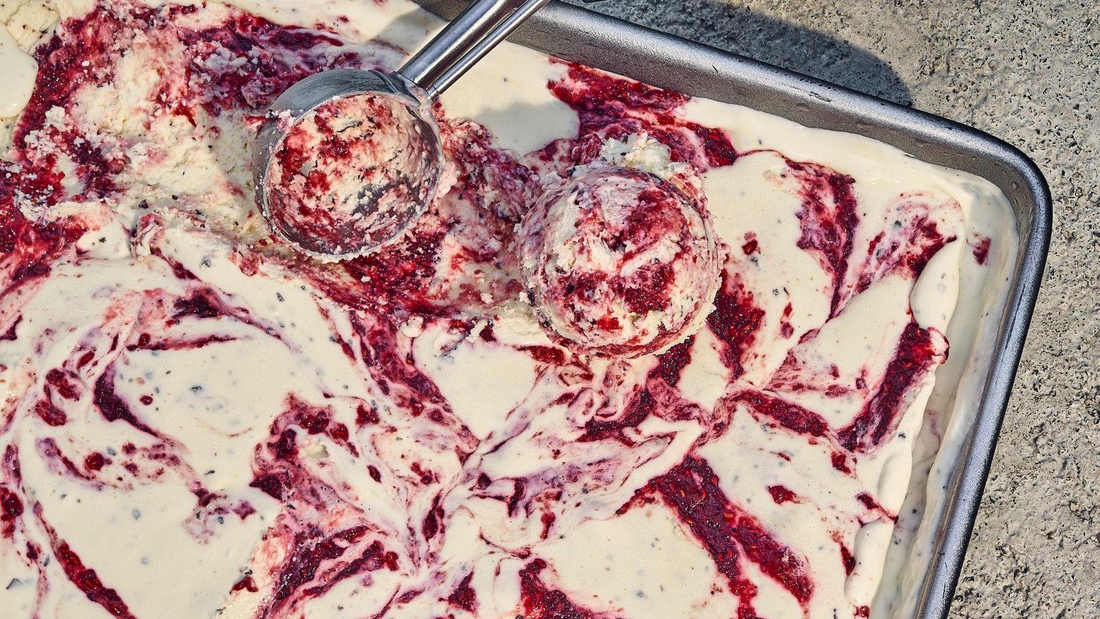 a pan of food that is covered in red and white stuff
