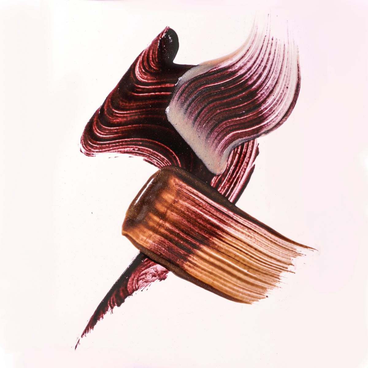 a close up of a brush with a white background