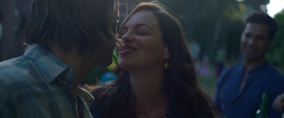 a man and a woman standing next to each other