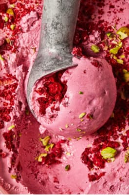 a scoop of pink ice cream in a bowl