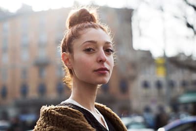 a woman with a bun in her hair