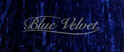 a blue velvet background with the word blue velvet on it
