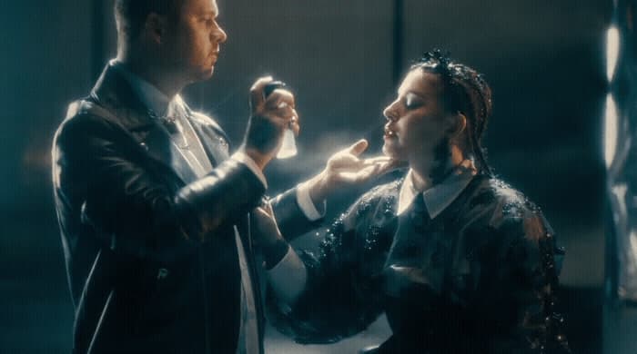 a man and a woman standing next to each other