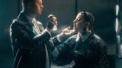 a man and a woman standing next to each other