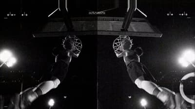 a person is doing a trick on a basketball hoop