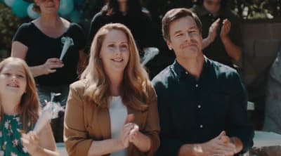 a group of people standing next to each other
