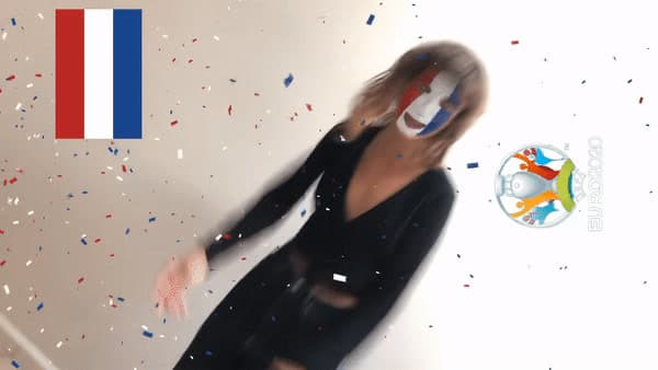a blurry photo of a woman in a black dress