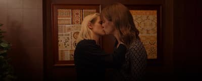 a couple of women standing next to each other