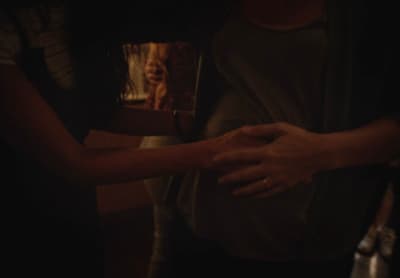 a couple of people standing next to each other