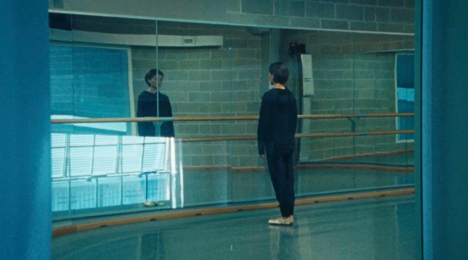 a couple of people that are standing in a room