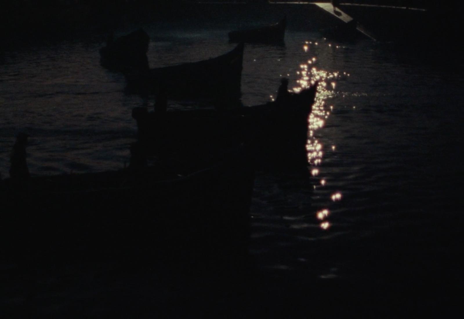 a couple of boats that are sitting in the water