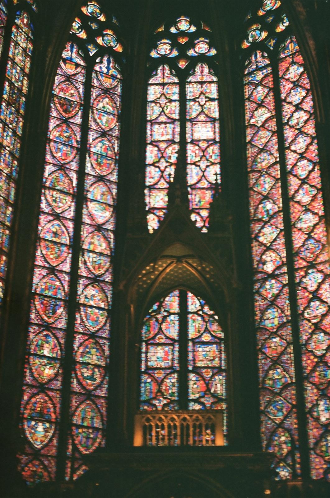 a view of a stained glass ceiling in a building