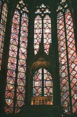 a view of a stained glass ceiling in a building