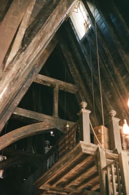 an overhead view of a wooden structure with lights
