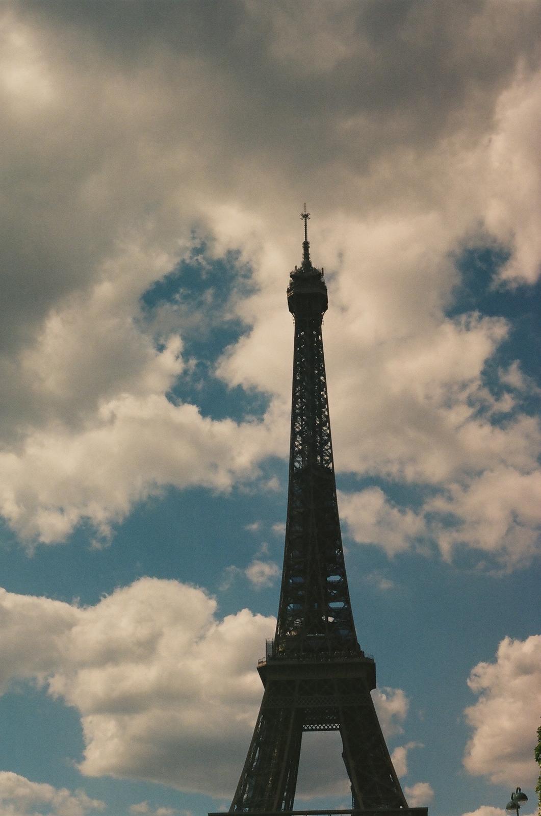 the eiffel tower towering over the city of paris
