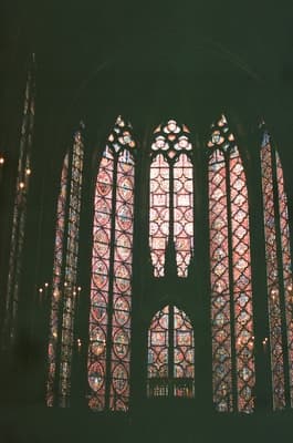 a large stained glass window in a building
