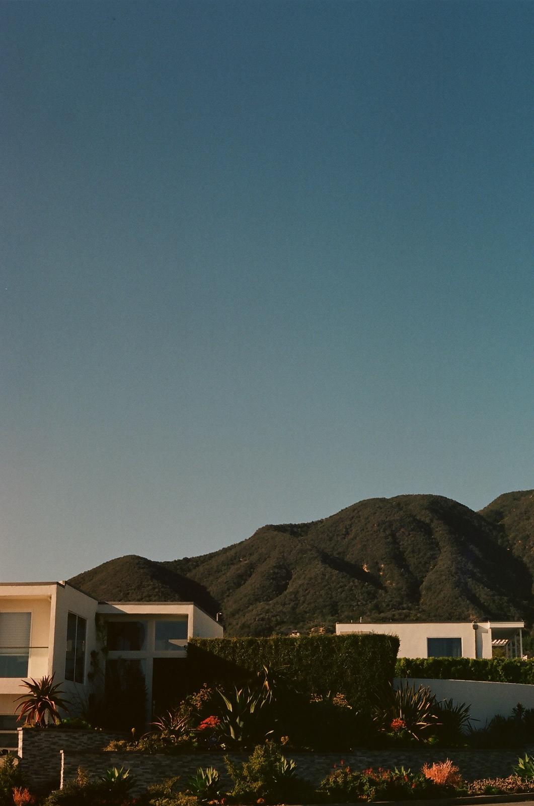 a house on the side of a cliff