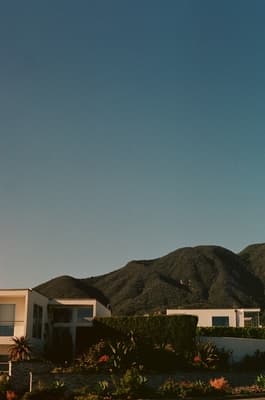 a house on the side of a cliff