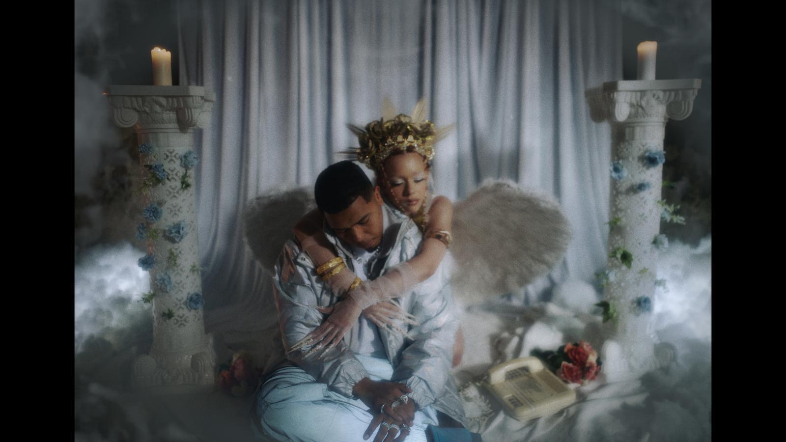a man and a woman sitting next to each other