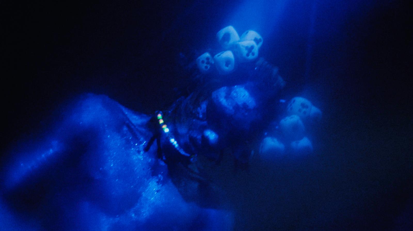 a group of people floating on top of a body of water