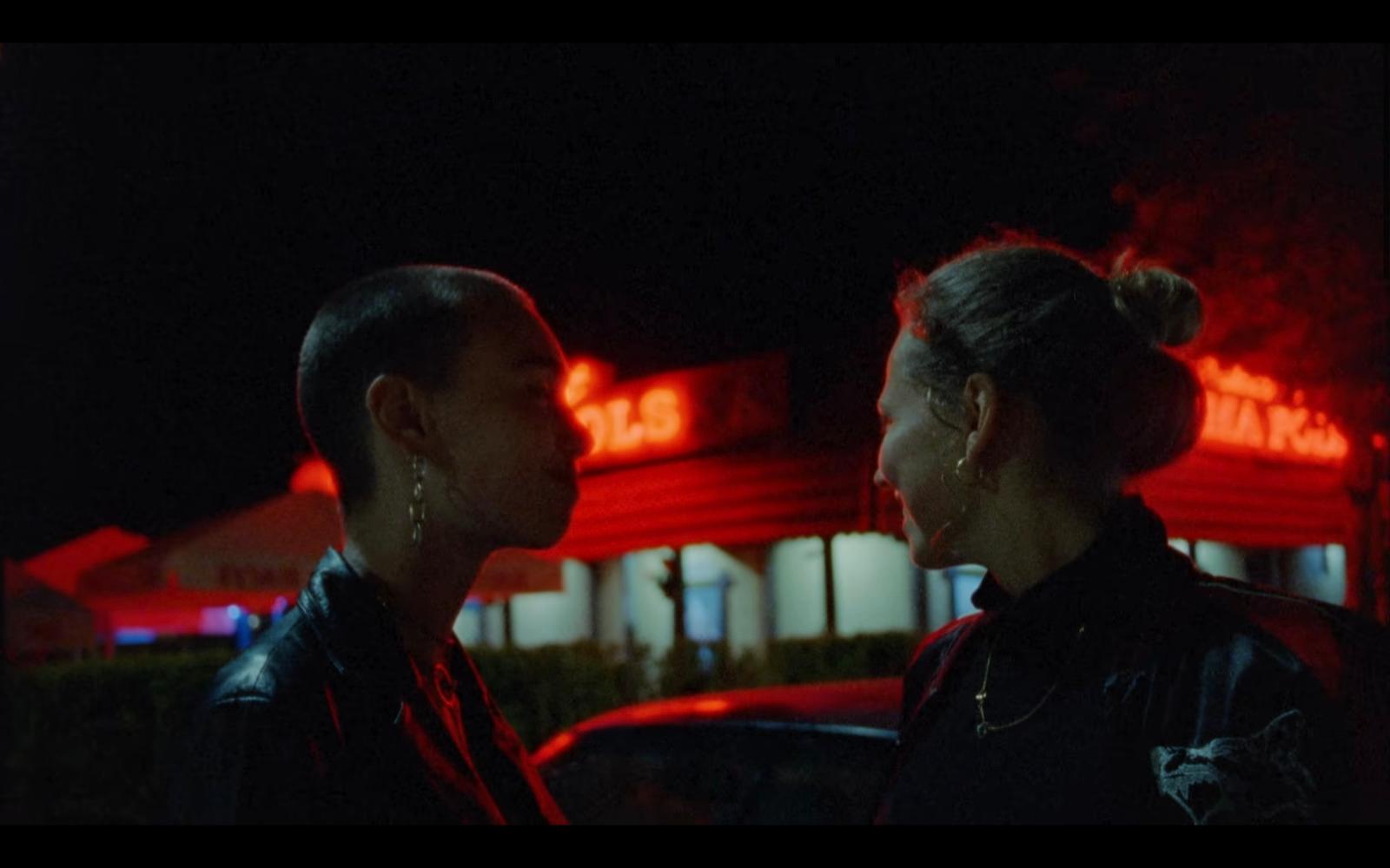 a couple of women standing next to each other